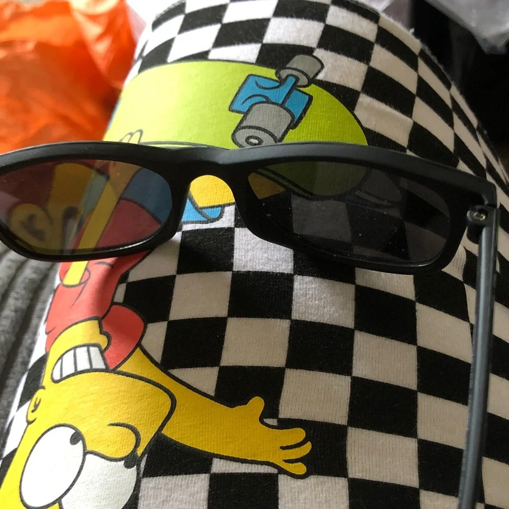 Green Pixel Frame Sunglasses on Checkerboard Skate Print